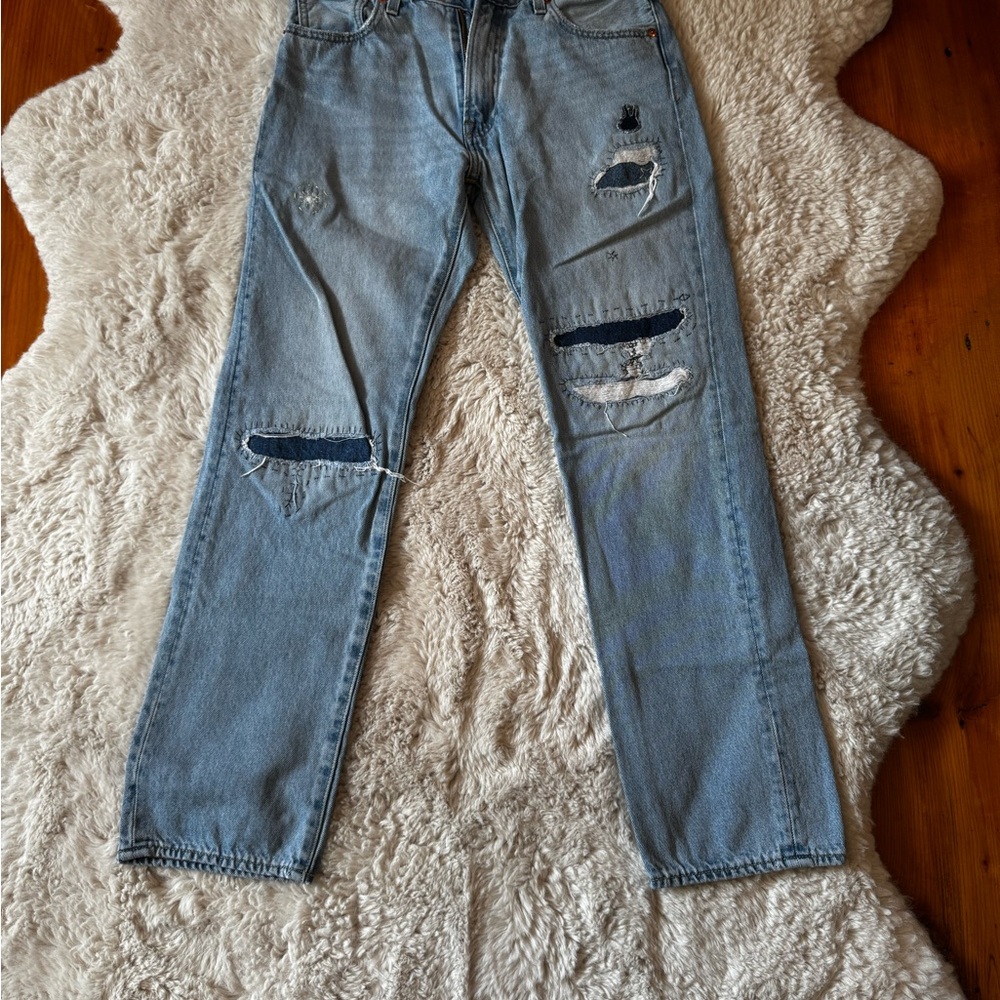 Levi’s unique boyfriend-style jeans with embroidery.